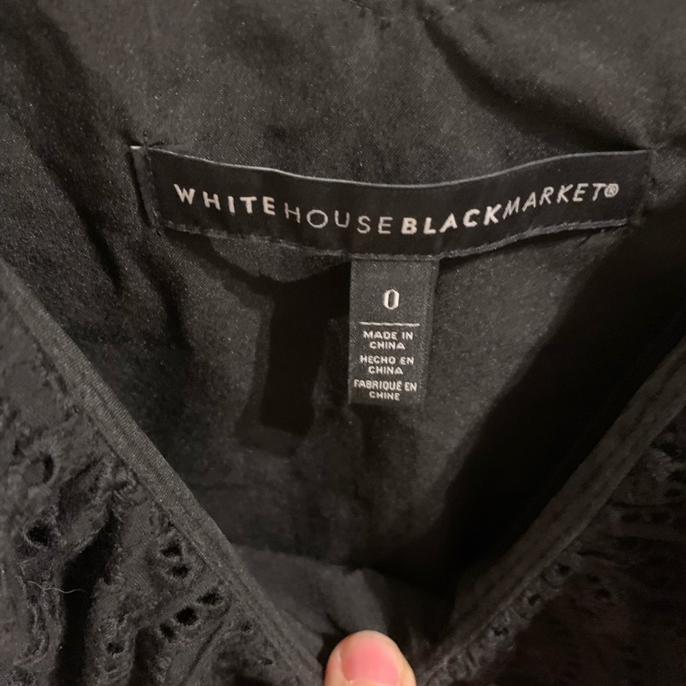 Size 0 White House Black Market top with ruffled neckline, fitted bodice.